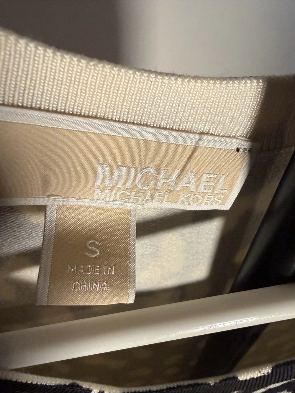 Michael Kors drapey round evening